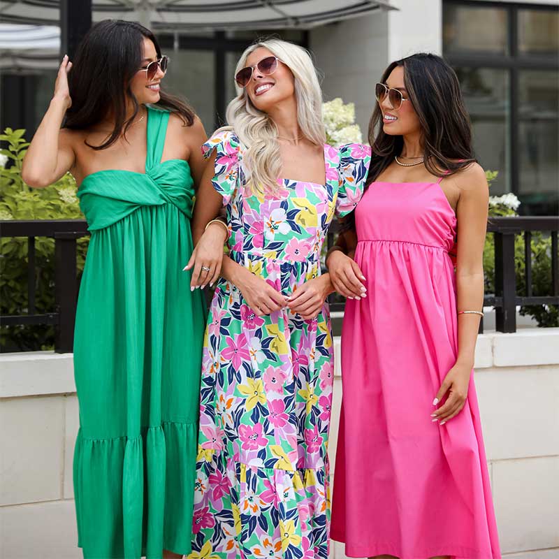 three girls with long dresses from dress up
